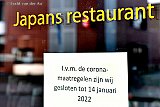 05-01-2022 Breda - Briefje op de deur van een restaurant ivm harde lockdown. Gisteren zijn er 24.590 mensen positief getest. Dit is een enorme stijging. Het is nog maar de vraag of dit restaurant 14 januari wel open mag. - Fotokrant