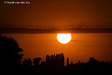 02-07-2026 Breda - Tijdens de zonsondergang lijkt het alsof het doek valt. - Fotokrant